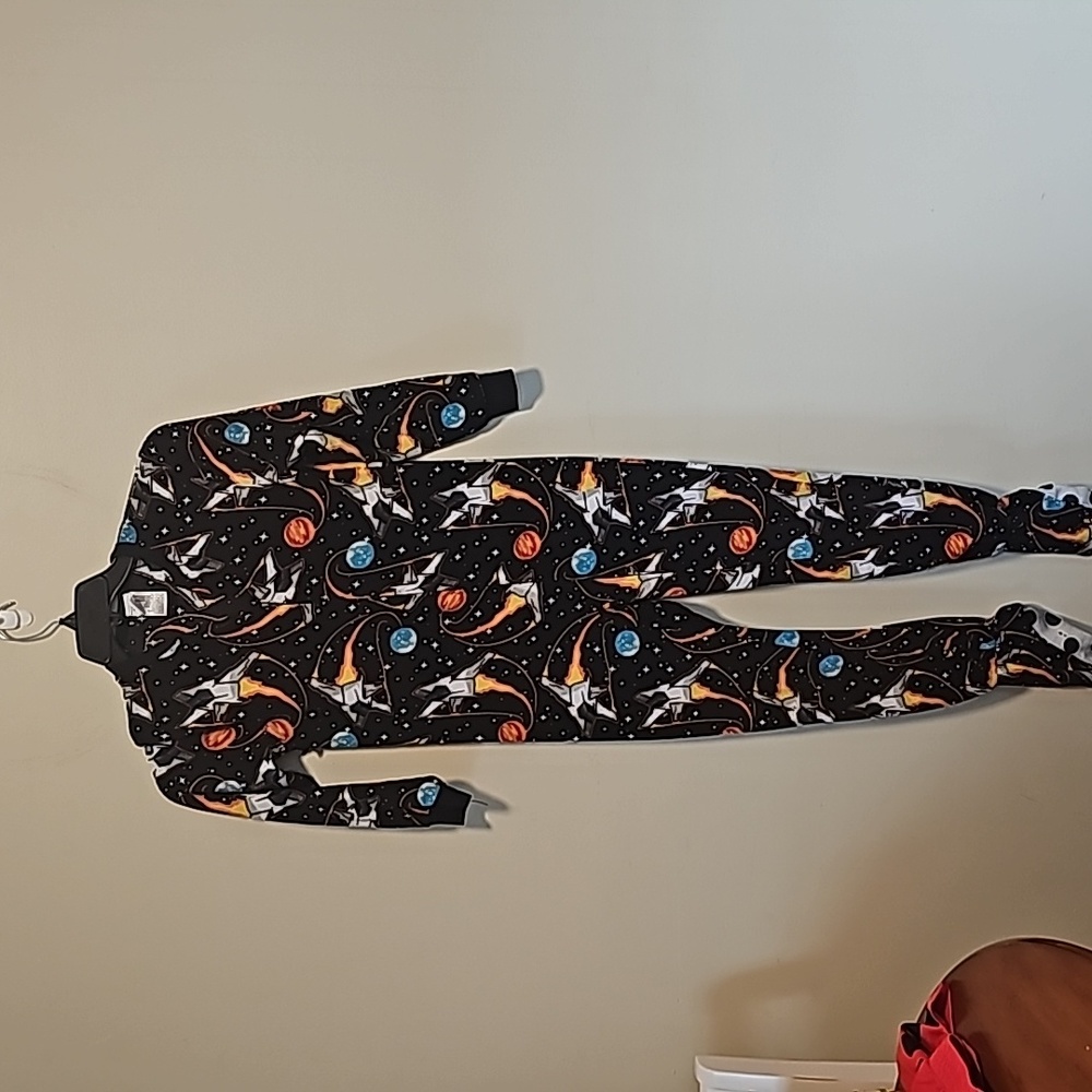 Space theme footed pajamas